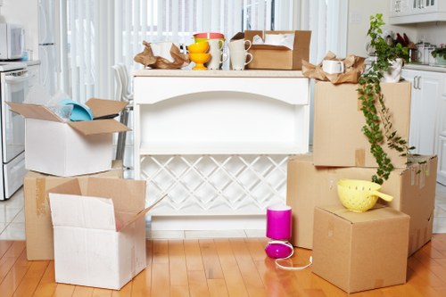 Careful loading of household items into a removal van in Dulwich