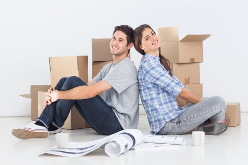 Careful loading of household items during a flat removal in Dulwich