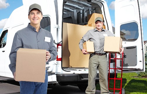 Packed boxes and furniture ready for transport in a Dulwich property