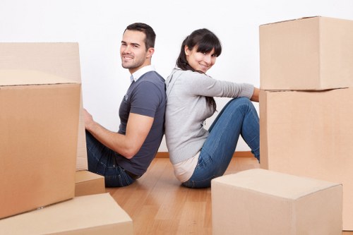 Careful loading of household items into a removal vehicle