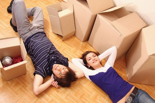 Boxes and recyclables being organised for responsible disposal