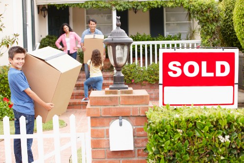 Local movers handling fragile items in a Dulwich property