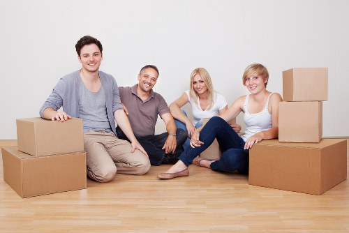 A moving team handling belongings in a Dulwich property