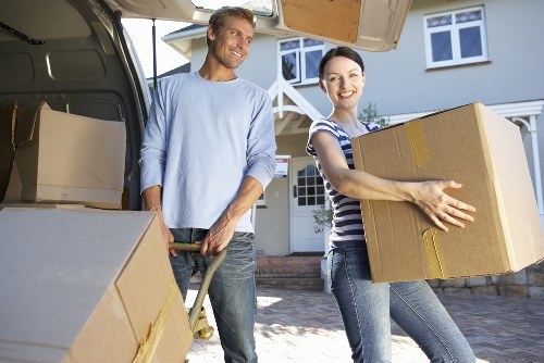 Packed boxes and furniture ready for flat removals in a Dulwich apartment