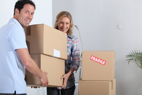 Removal crew handling household items during a move